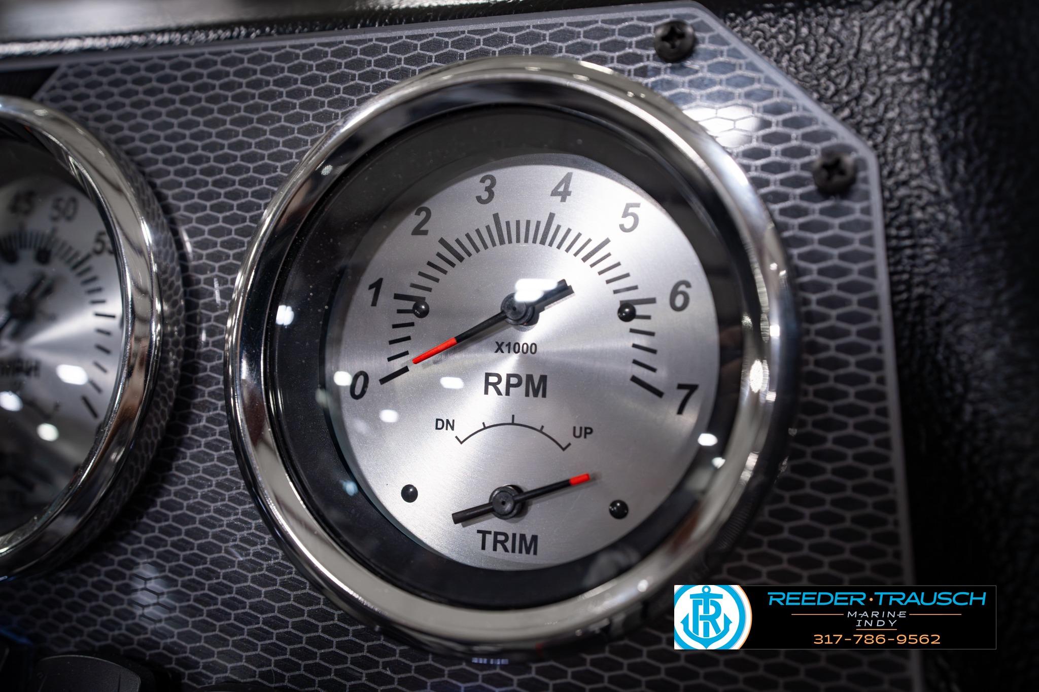 Close-up of RPM gauge on 2026 Lund 1650 Rebel XL SS boat dashboard.