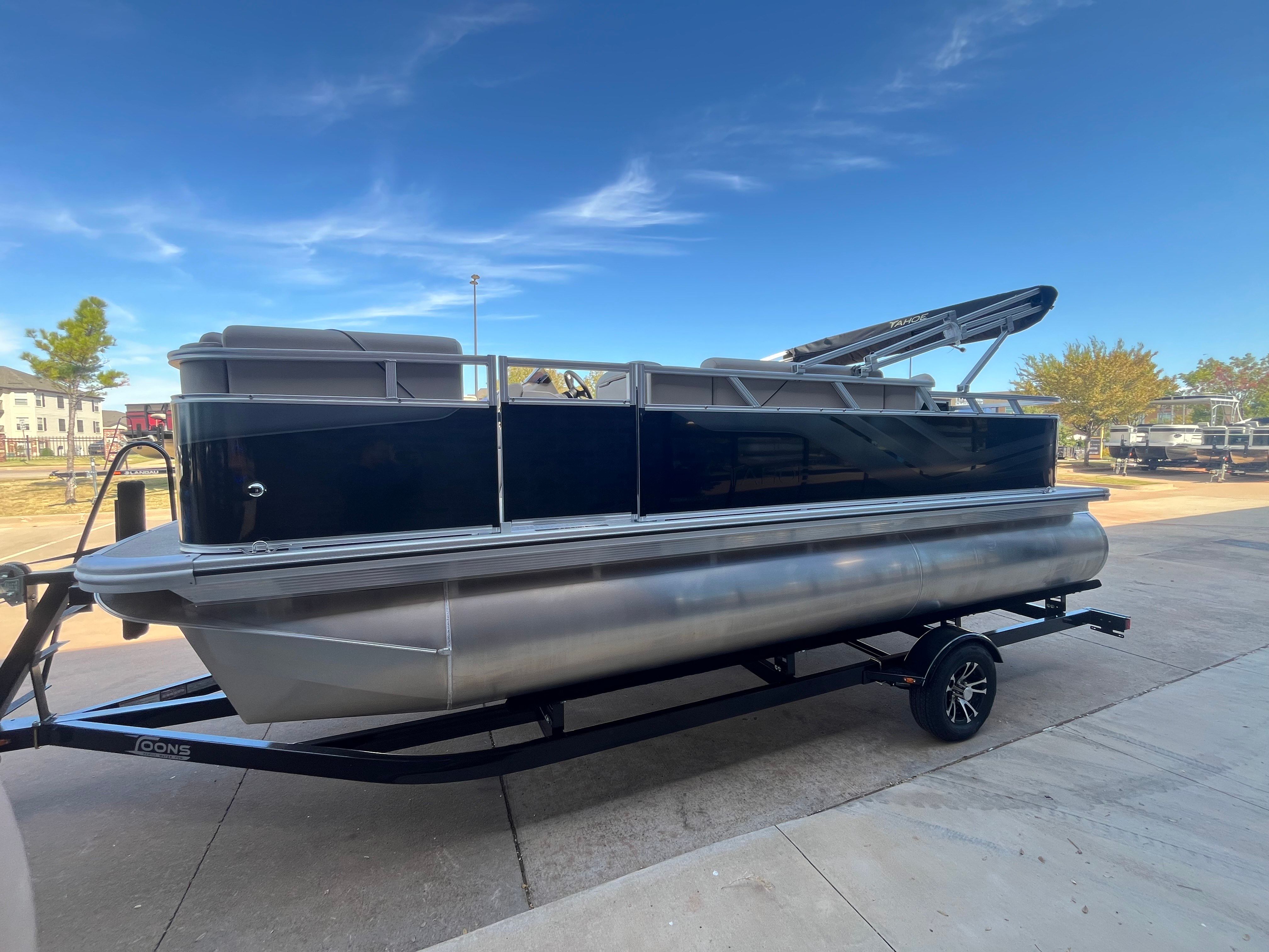 2026 Tahoe 1925 Sport Rear Fish pontoon boat on trailer.