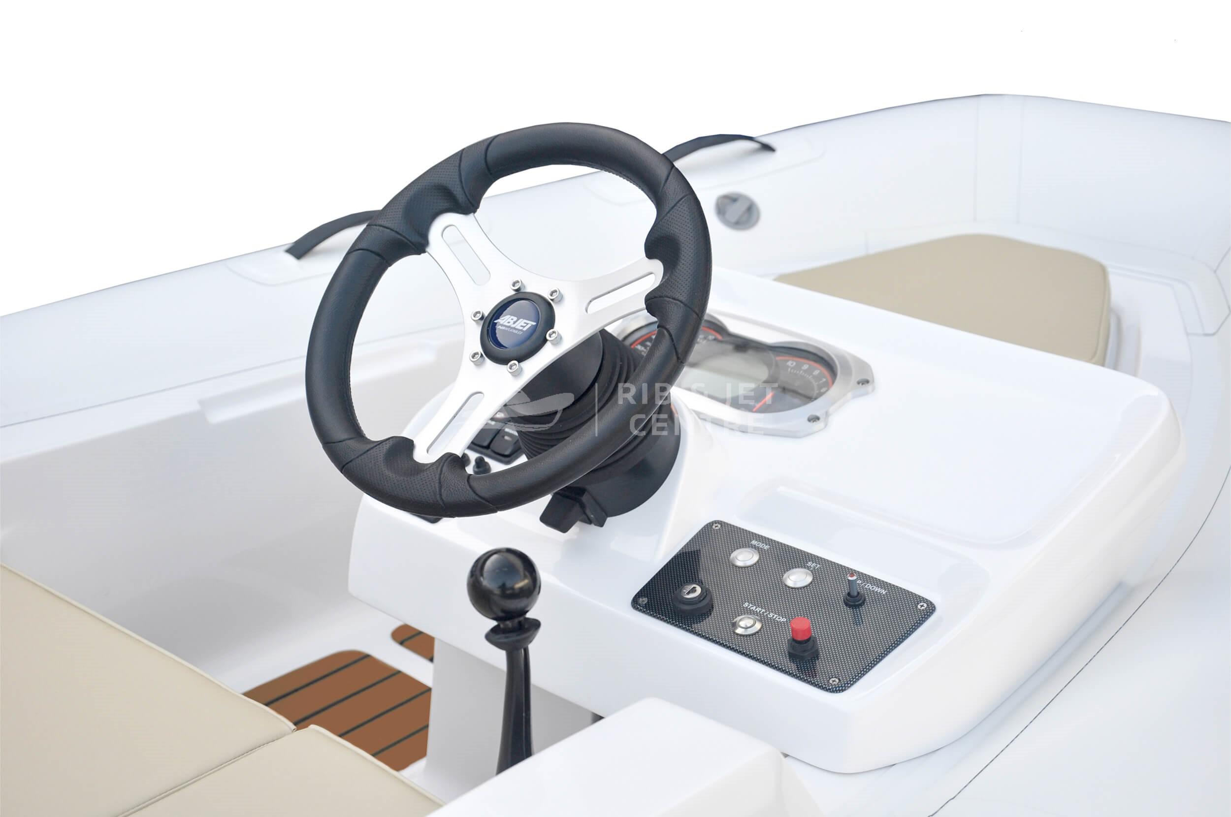 2023 AB Inflatables ABJET 350XP boat interior with steering wheel and control panel.