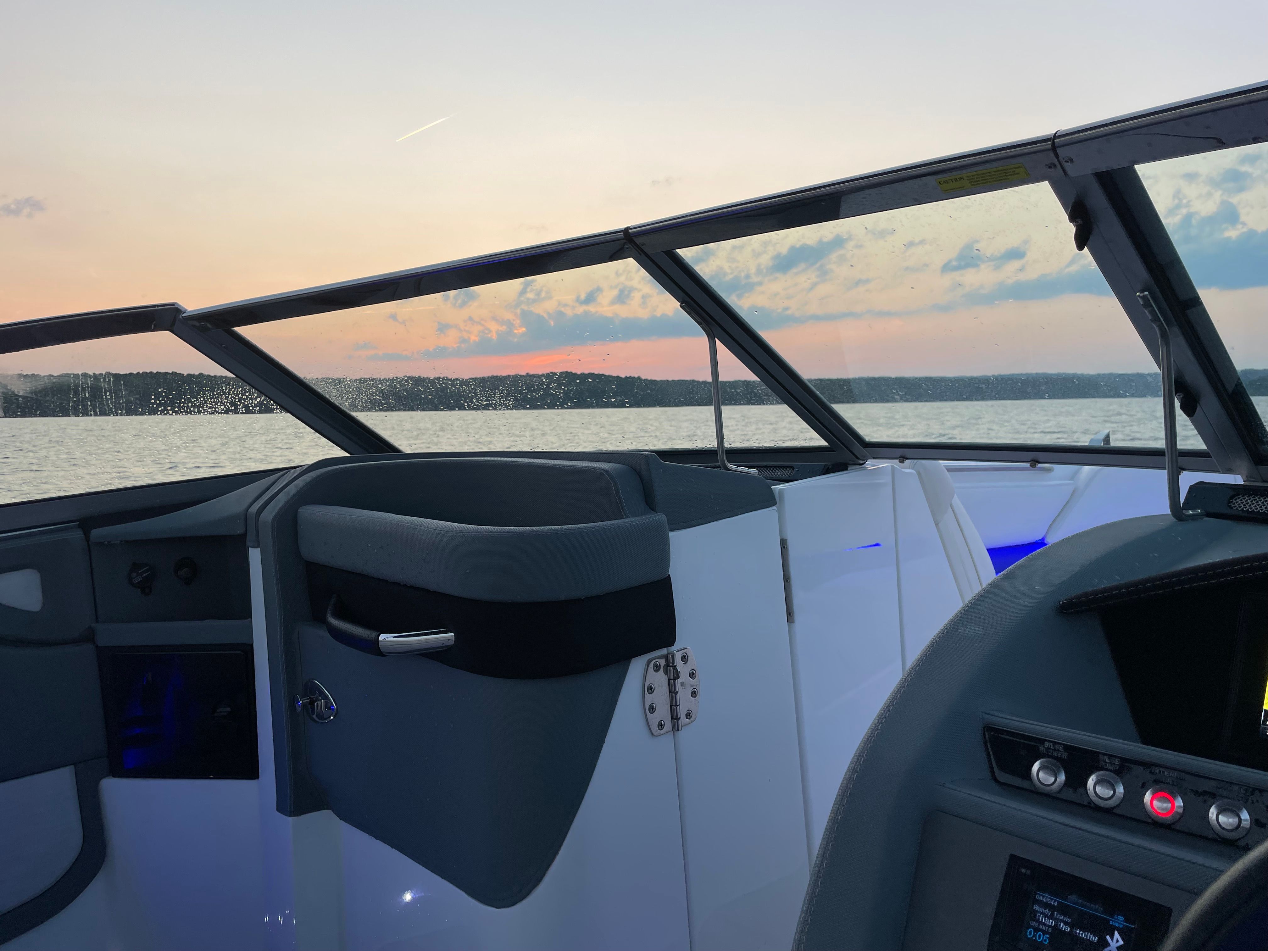 2017 Cobalt R5 boat interior at sunset on the water.