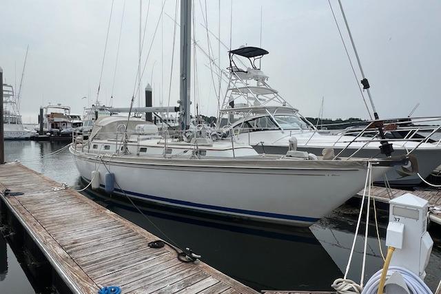 1986 Little Harbor AFt Cockpit K/CB Sloop docked at marina.