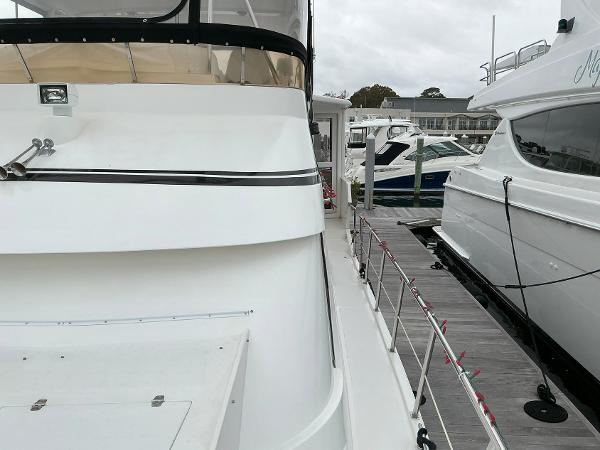 Novatec Islander 55 yacht docked at marina, side view, 2000 model.