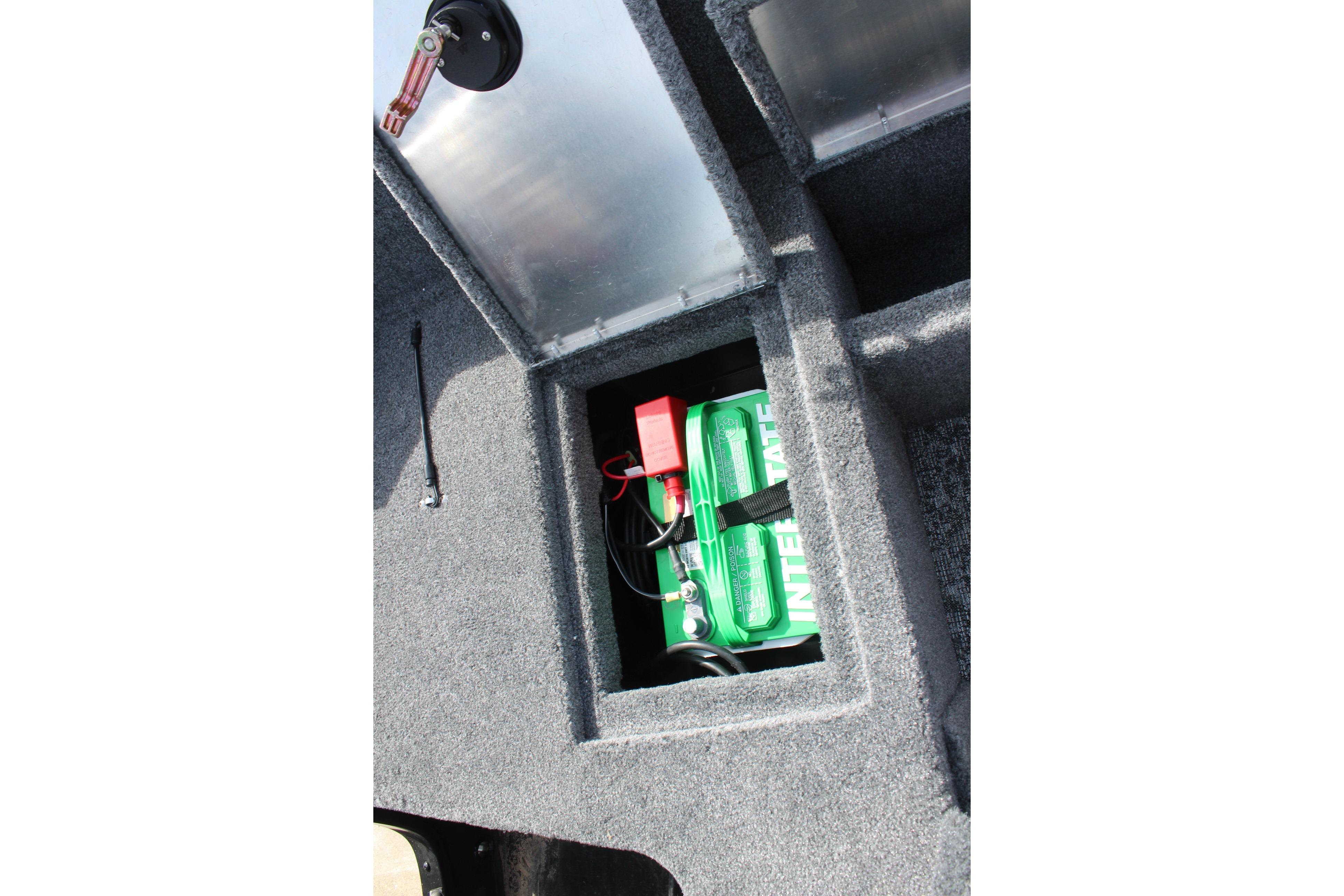 Battery compartment of 2026 Tracker Pro Guide V-16 WT boat, featuring Interstate battery.