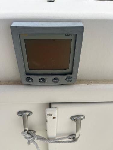 Depth gauge on 1985 Hatteras 45 Convertible boat dashboard.