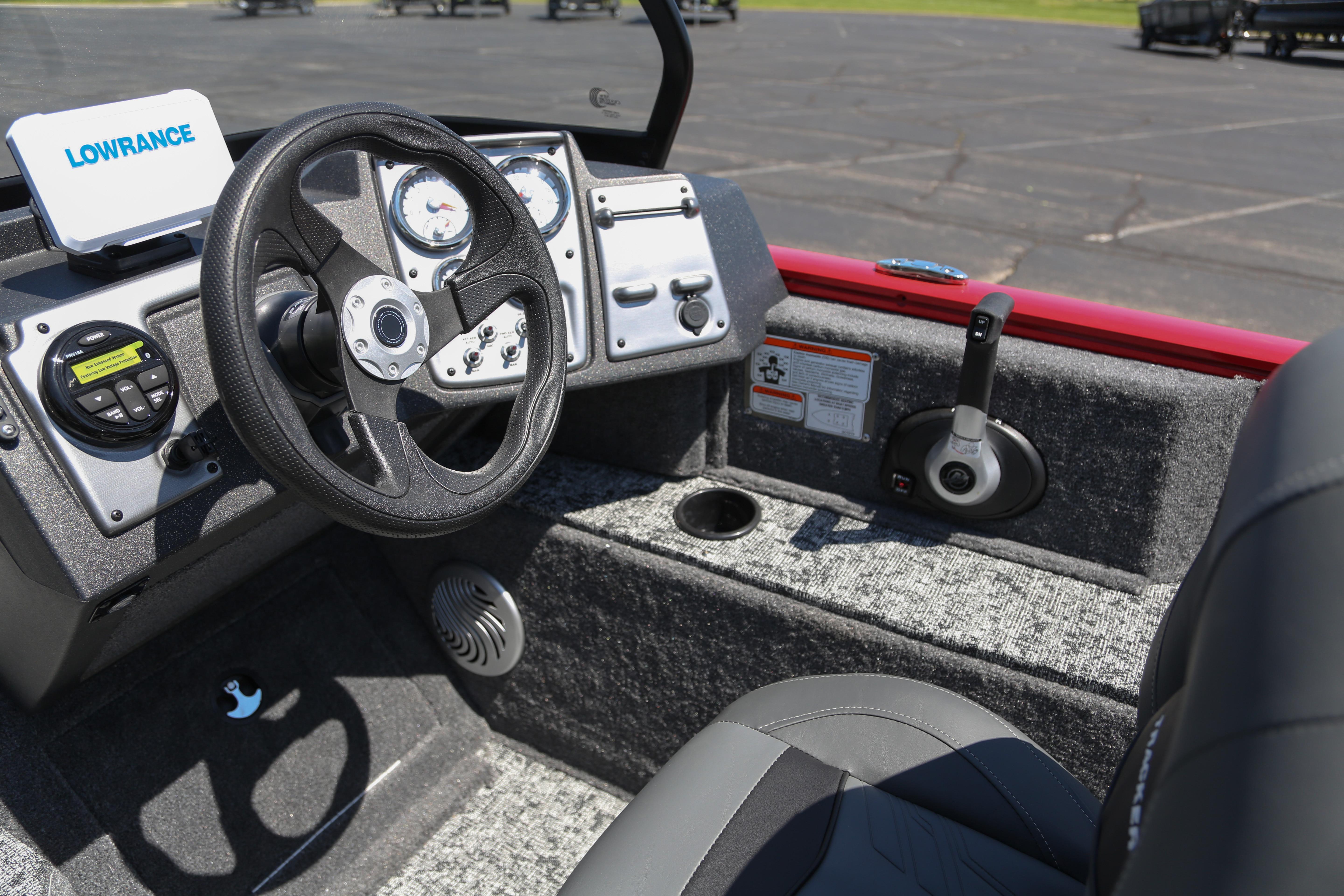 Interior of 2026 Tracker Pro Guide V-175 Combo boat with steering wheel and controls.