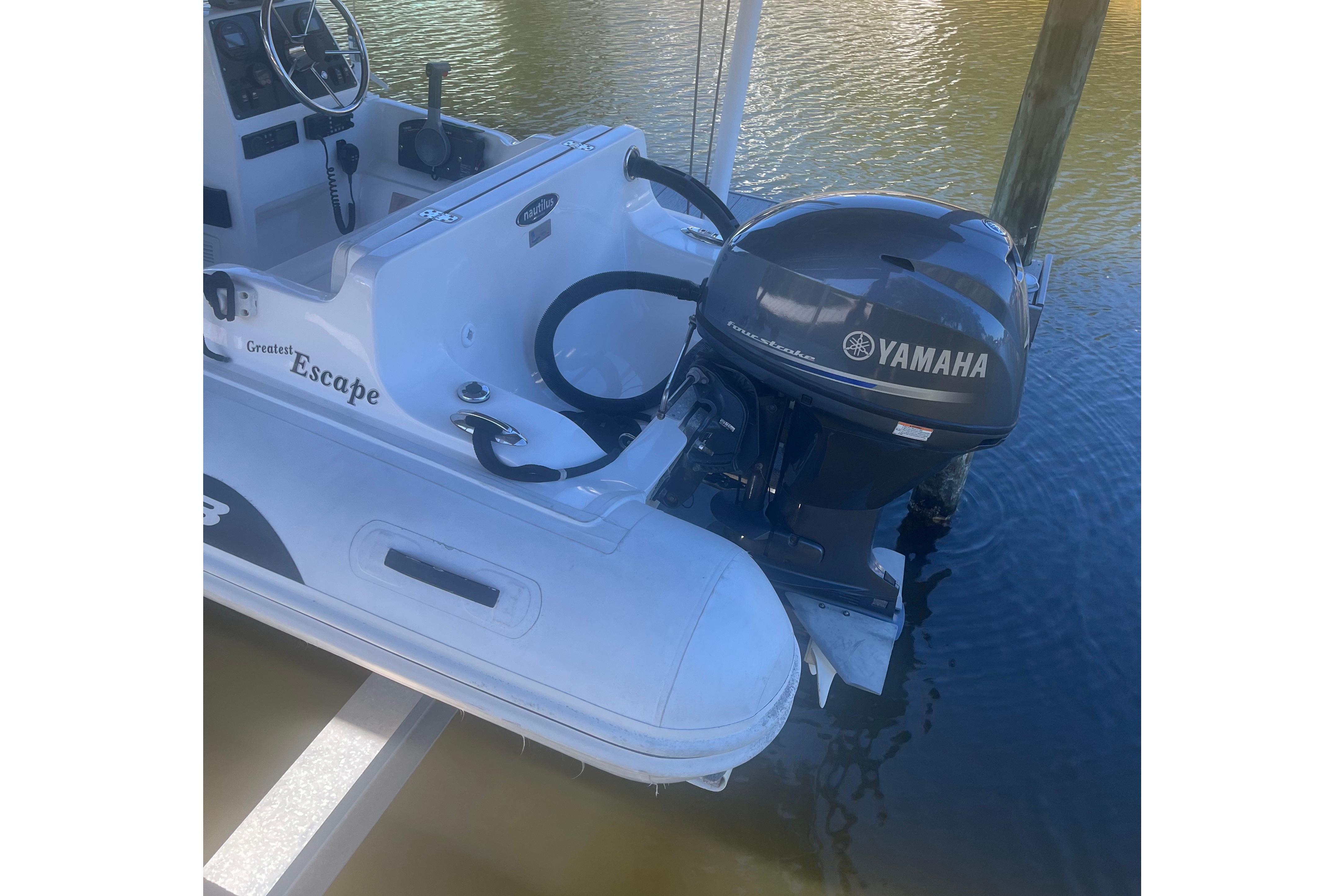 2012 AB Inflatables Nautilus 12 DLX with Yamaha outboard motor on water.