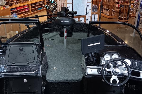 2025 Nitro ZV20 boat interior with steering wheel and navigation system.