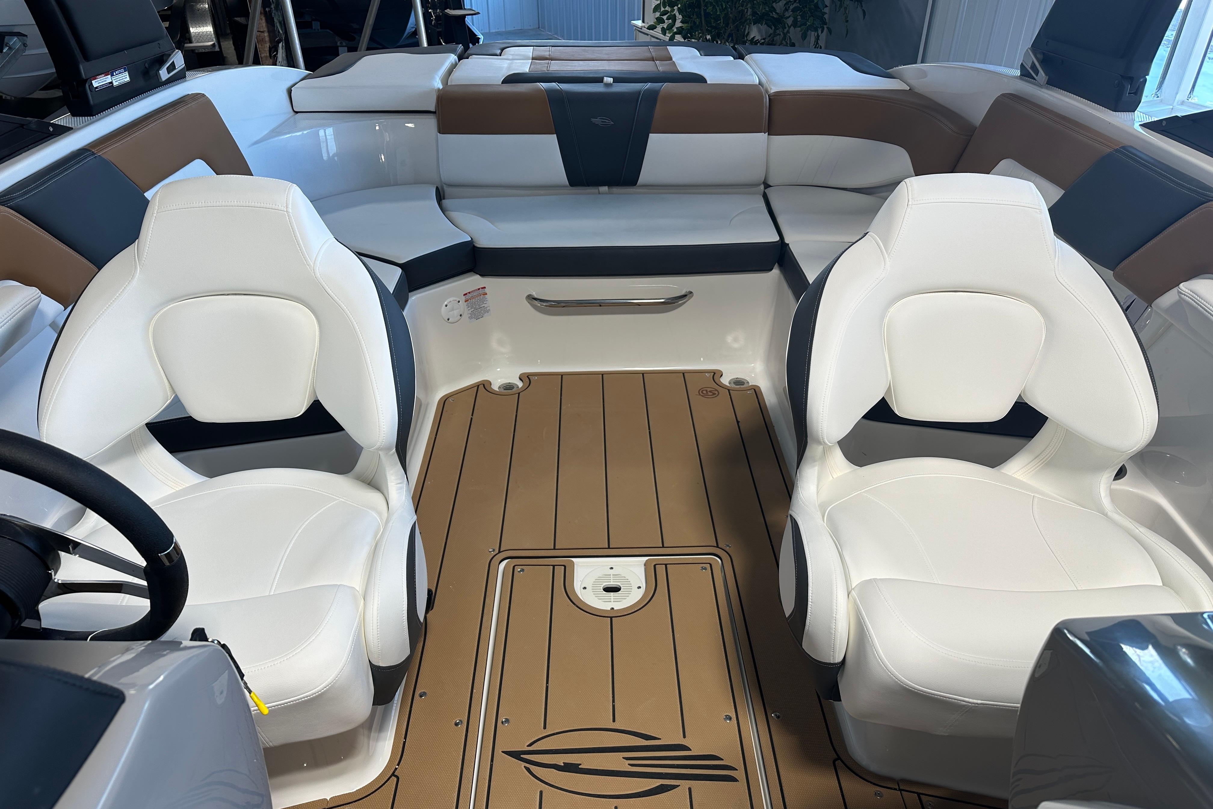 Interior of 2026 Chaparral 23 SSi with white seating.