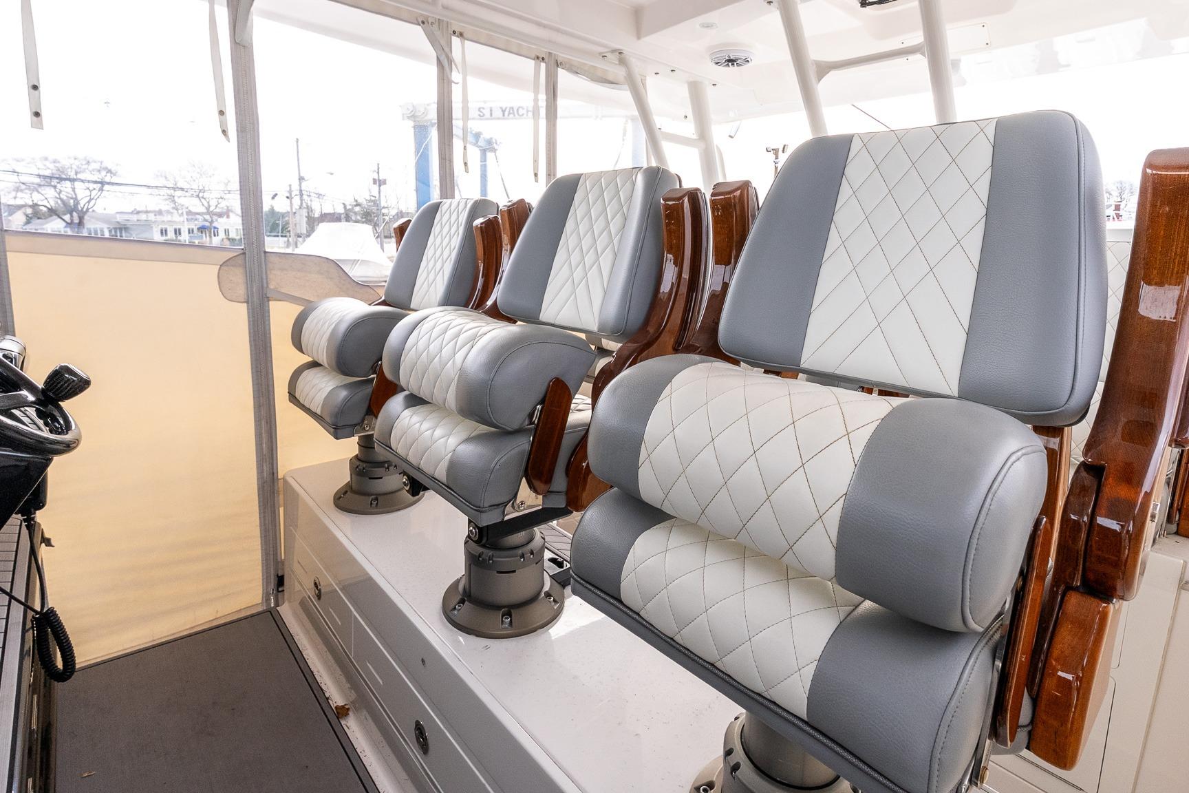 2023 Everglades 455 Center Console boat with luxurious seating and modern design.