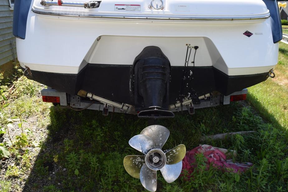 Rear view of a 2006 Cobalt 240 boat with visible propeller and outdrive.