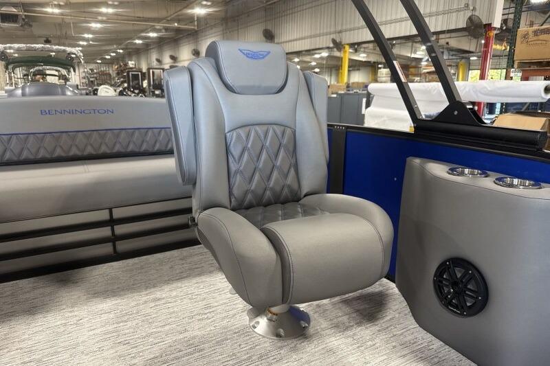 Luxurious seating on 2026 Bennington 23 LXS Swingback pontoon boat, featuring elegant design and comfort.