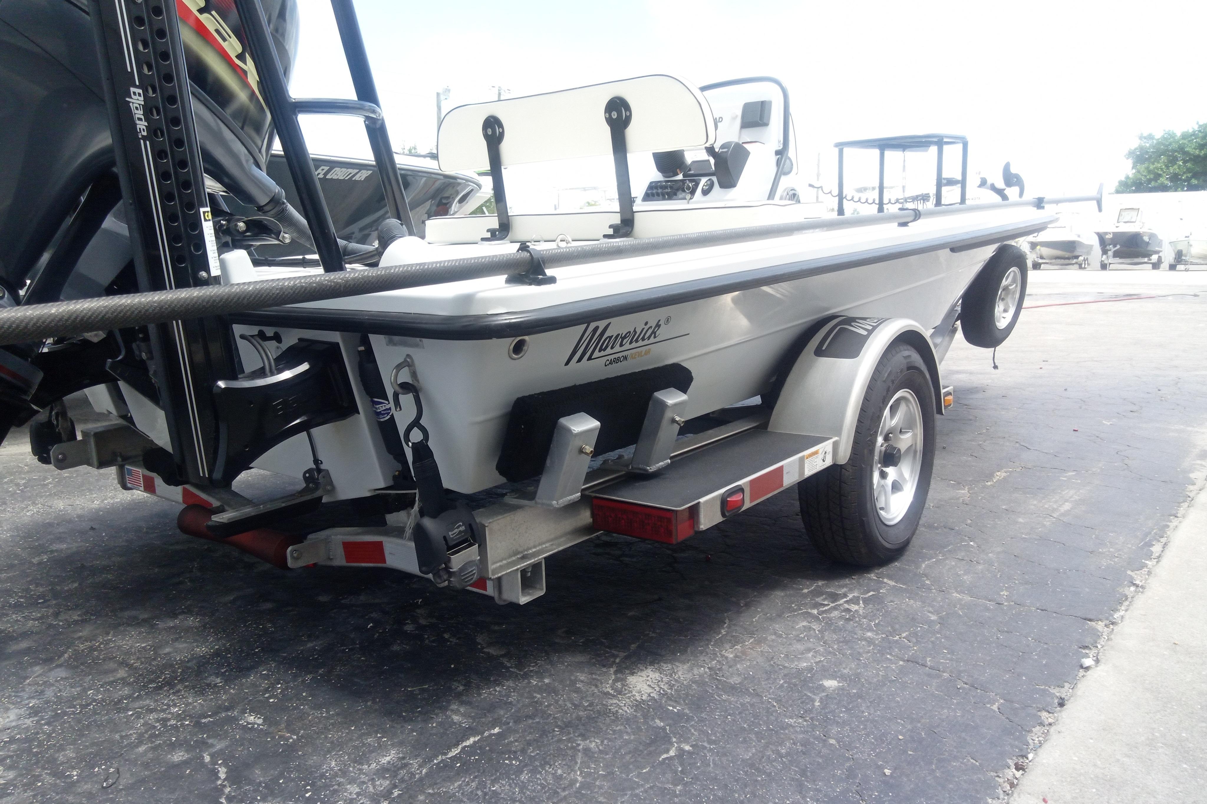 2020 Maverick 18 HPX-V boat on trailer, rear view, parked on pavement.
