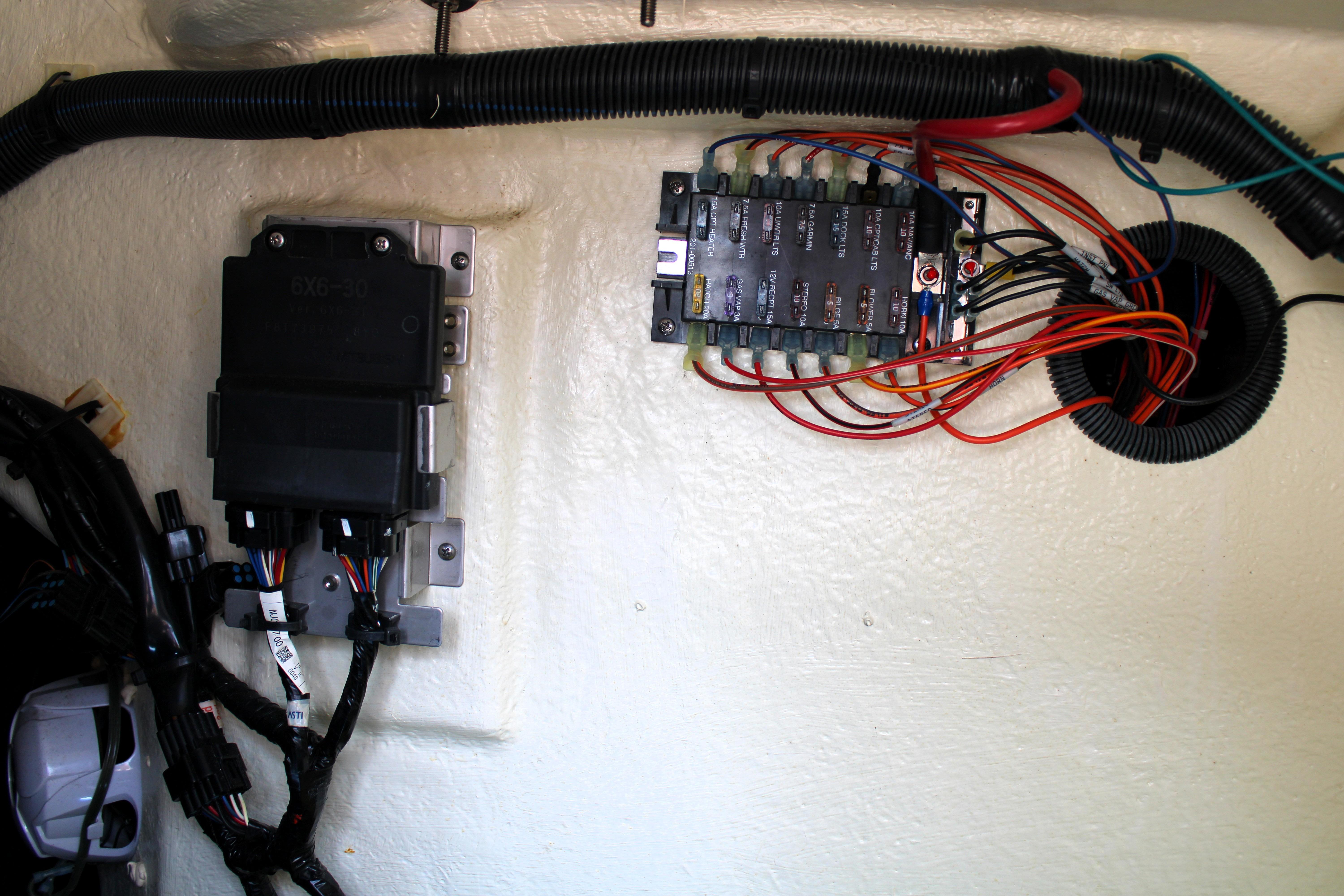 Electrical wiring and fuse panel inside a 2021 Regal 26 OBX boat.