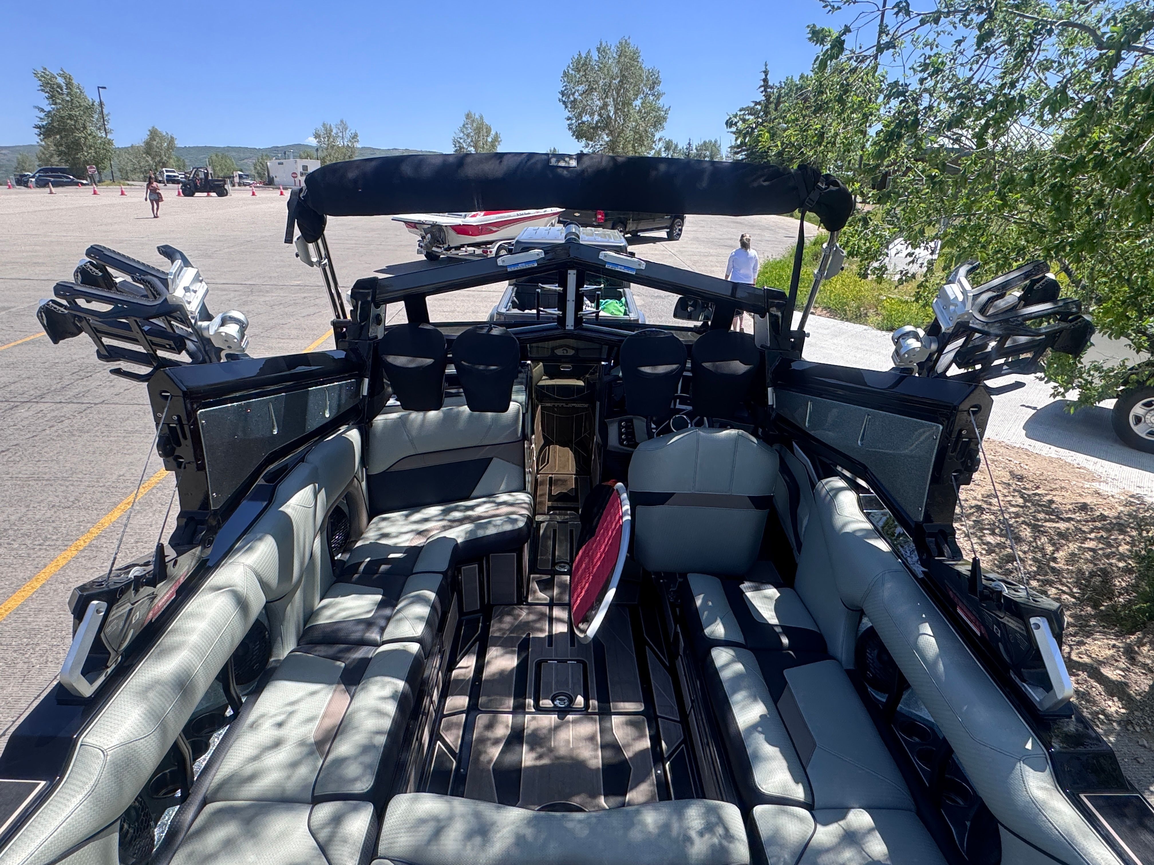 The image shows the interior of a 2022 Centurion Ri230 boat with luxurious seating.
