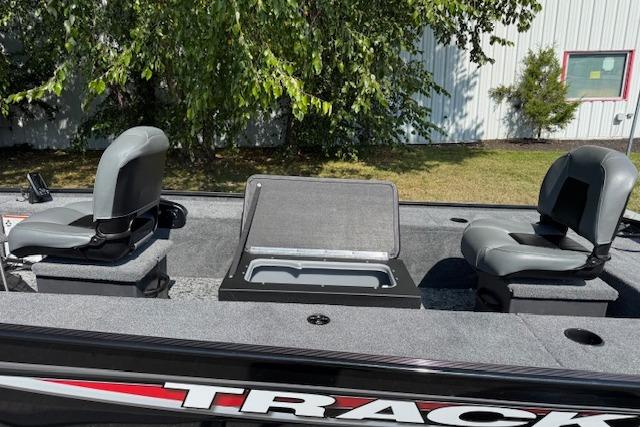 2026 Tracker Panfish 17 boat interior with two seats and storage compartment.