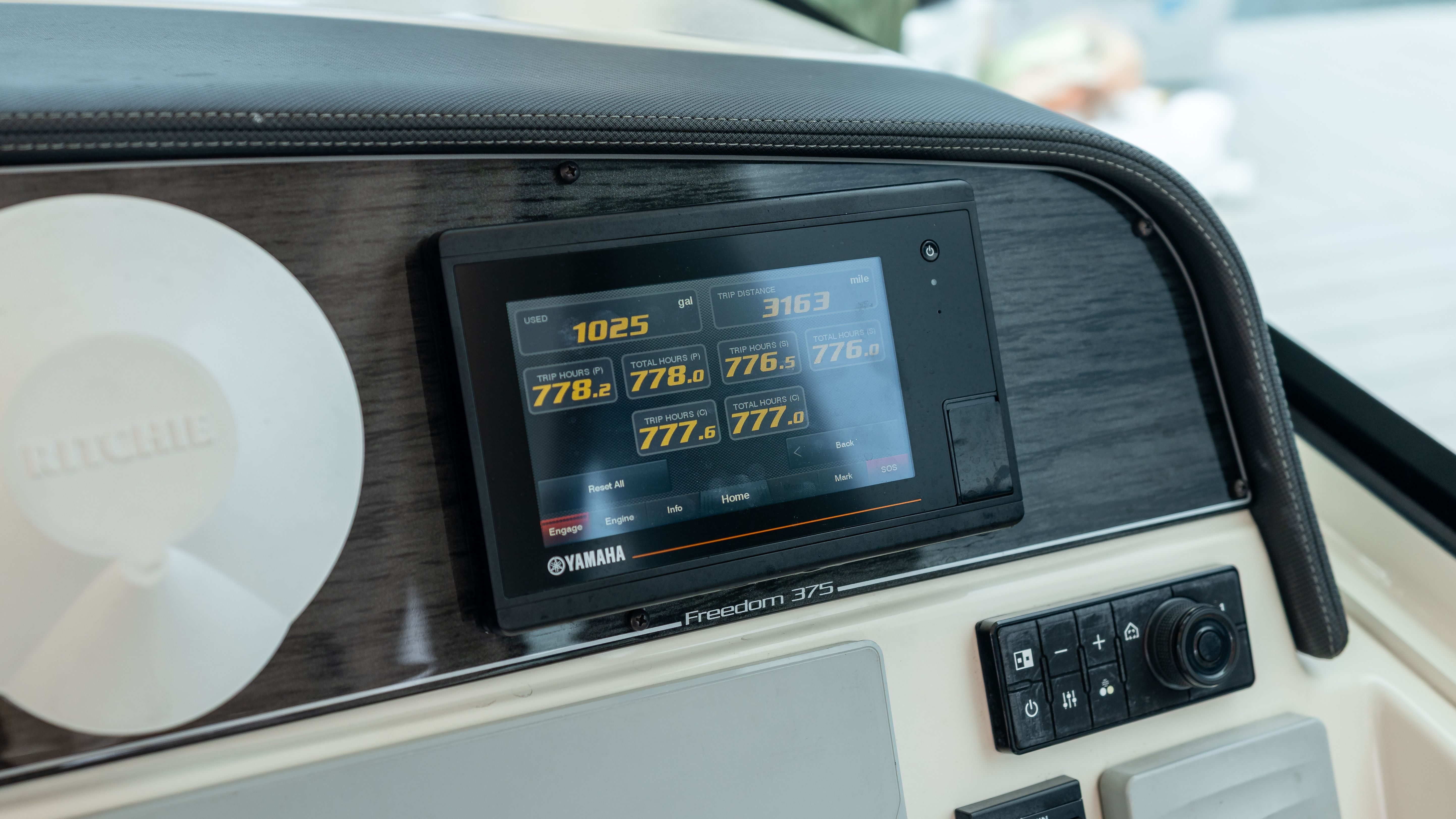Dashboard of the Grady-White 375 Freedom with Yamaha display and controls.