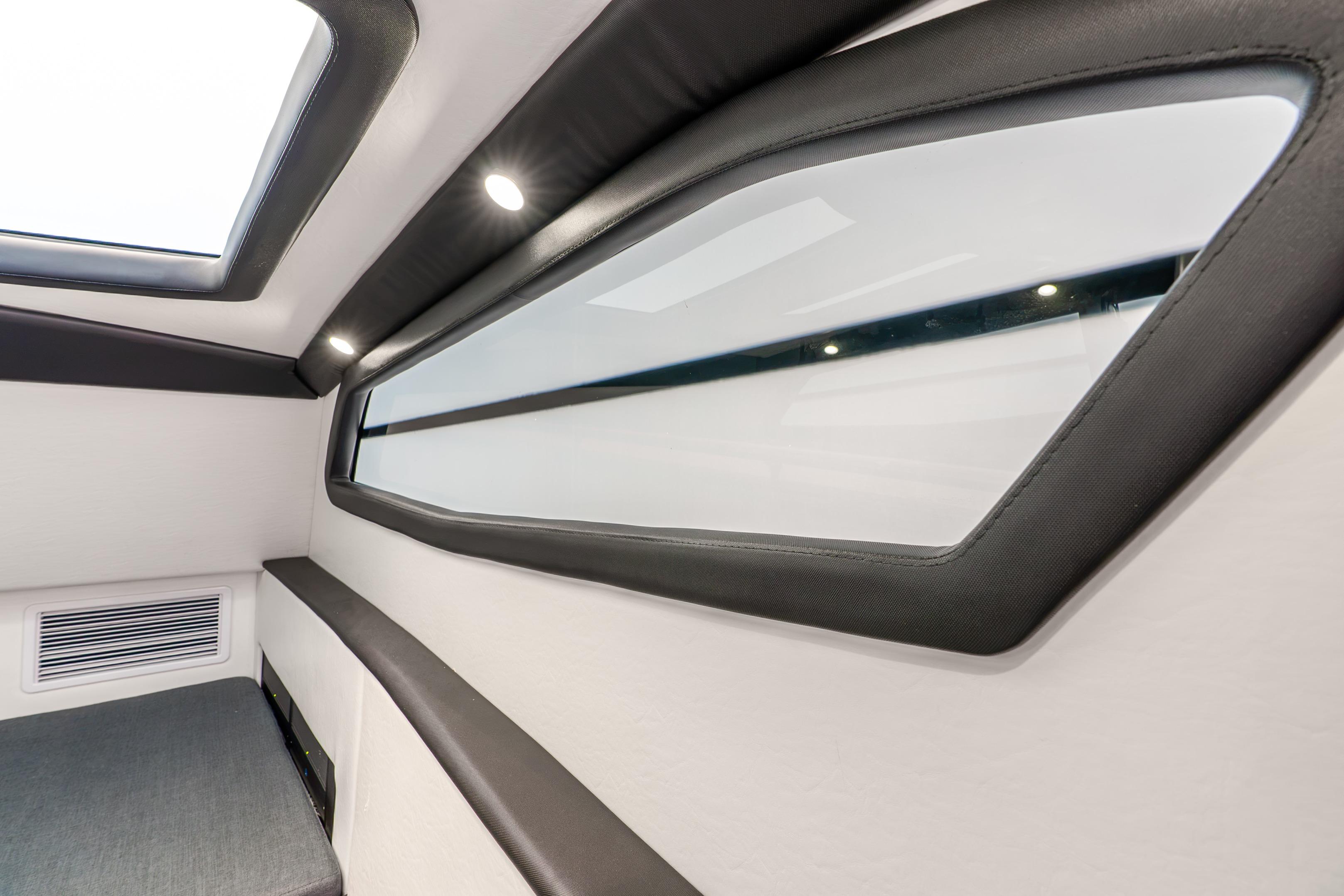 Interior cabin of 2024 Nor-Tech 452 Super Fish, featuring sleek design and modern lighting.