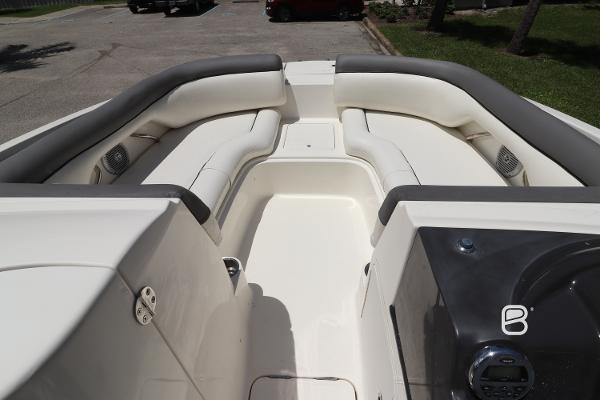 2018 Bayliner 210 DB boat interior with white seating and gray accents.