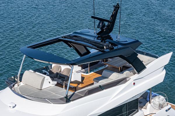 Luxurious 2025 Sunseeker Manhattan 68 yacht with spacious deck and modern design.