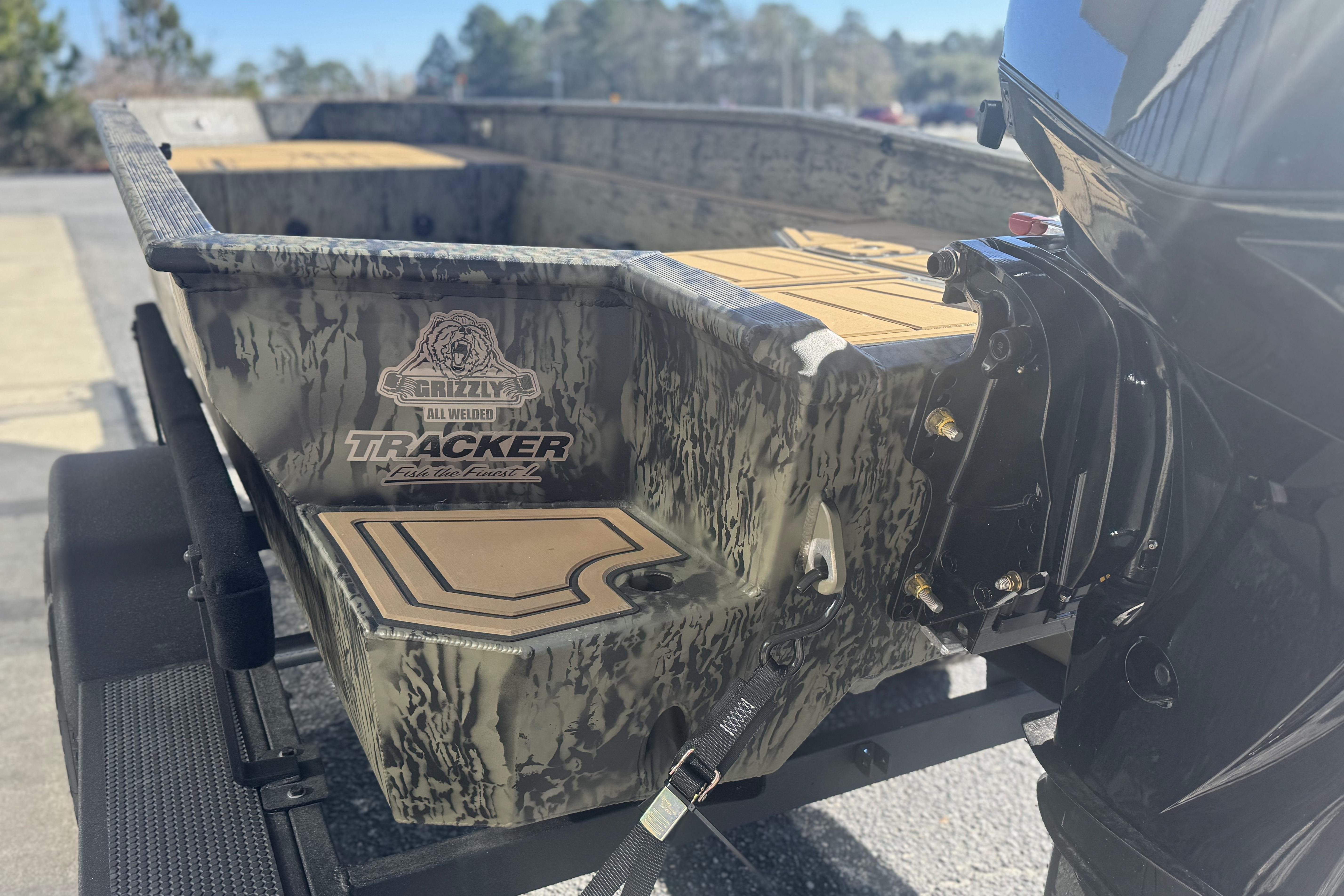 2026 Tracker Grizzly 1650 T Prairie Wings Edition boat with camouflage design.