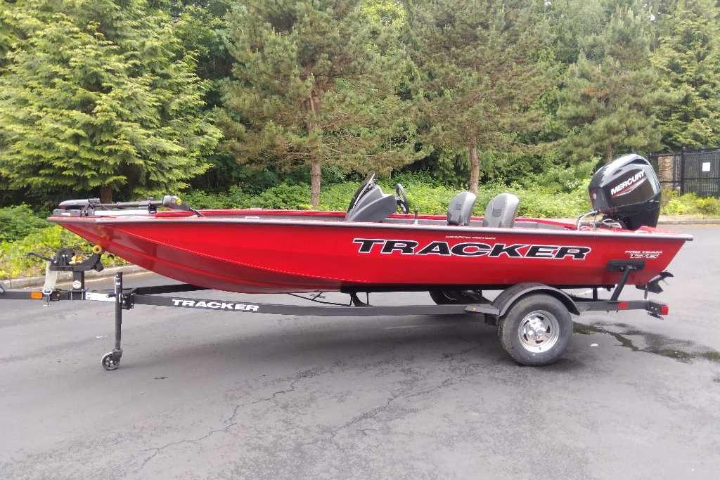 2026 Tracker Pro Team 175 Crappie Edition boat in vibrant red on trailer.