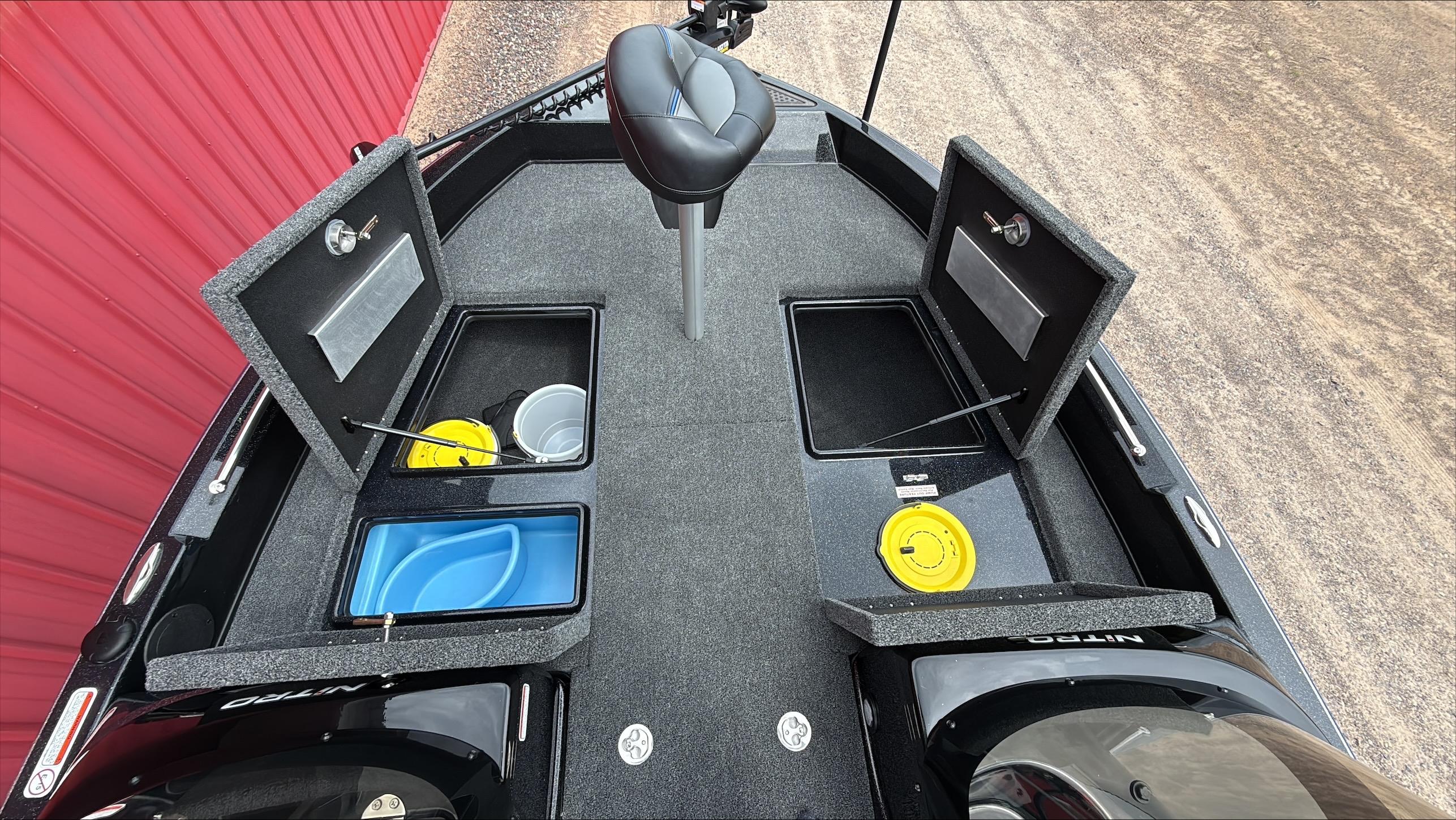 2025 Nitro ZV19 boat interior with open storage compartments and seating.