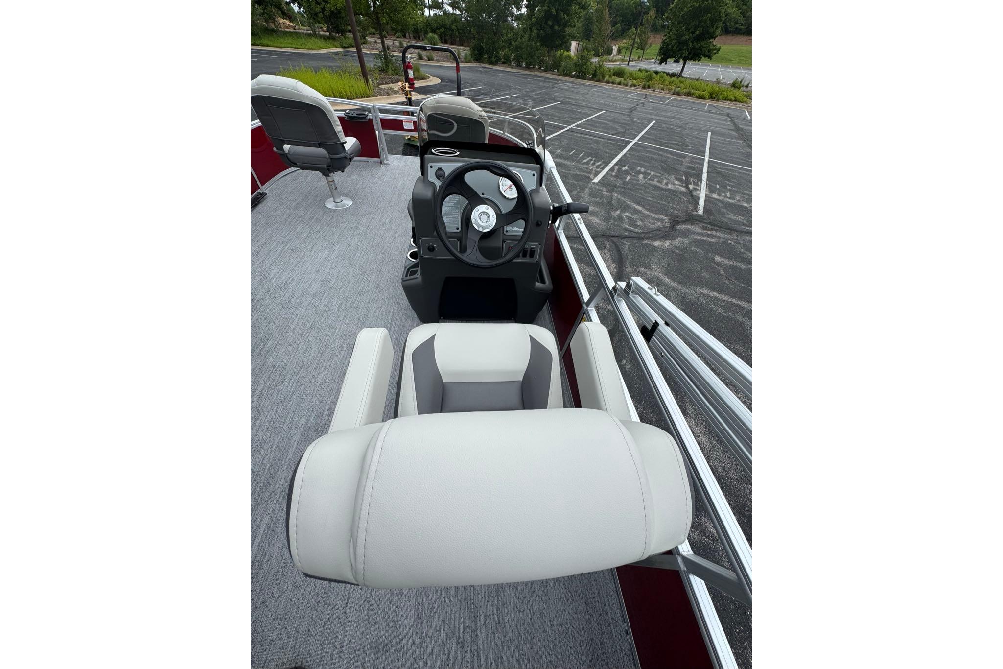2026 Sun Tracker Bass Buggy 16 XL Select boat interior with steering console and seating.