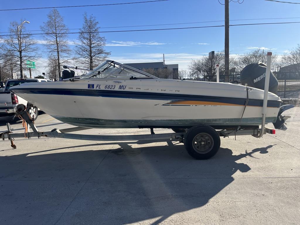 2004 Bayliner 175 boat on trailer in sunny setting.