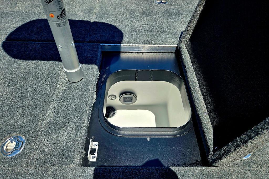 2026 Skeeter ZXE20 boat storage compartment with open hatch, showcasing interior design.