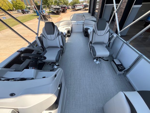 Interior of 2025 Tahoe LTZ QL pontoon boat with luxurious seating.