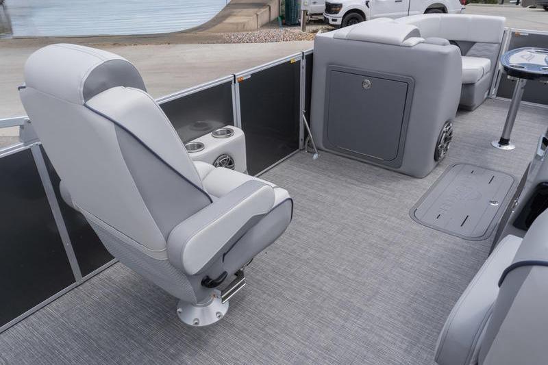 2026 SunCatcher Elite 326 SL pontoon boat interior with gray seating and flooring.