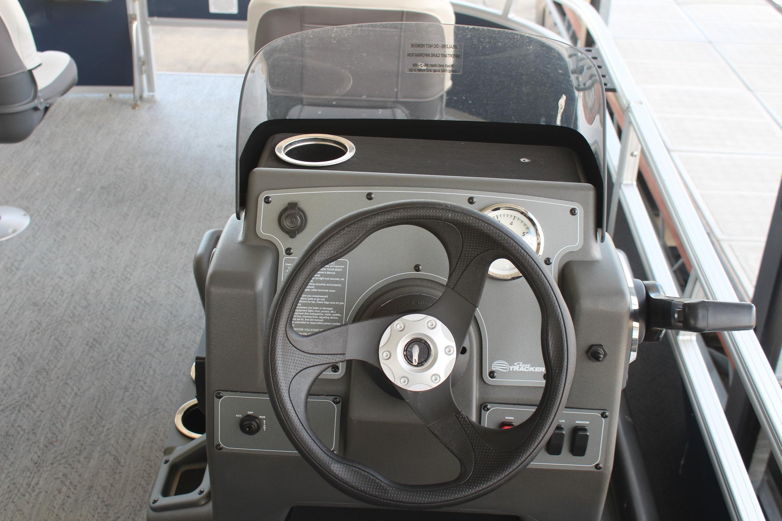 Steering console of 2026 Sun Tracker Bass Buggy 16 XL Select pontoon boat.