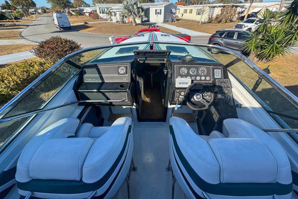 1989 Formula 292 SR-1 boat cockpit with steering wheel and dashboard controls.