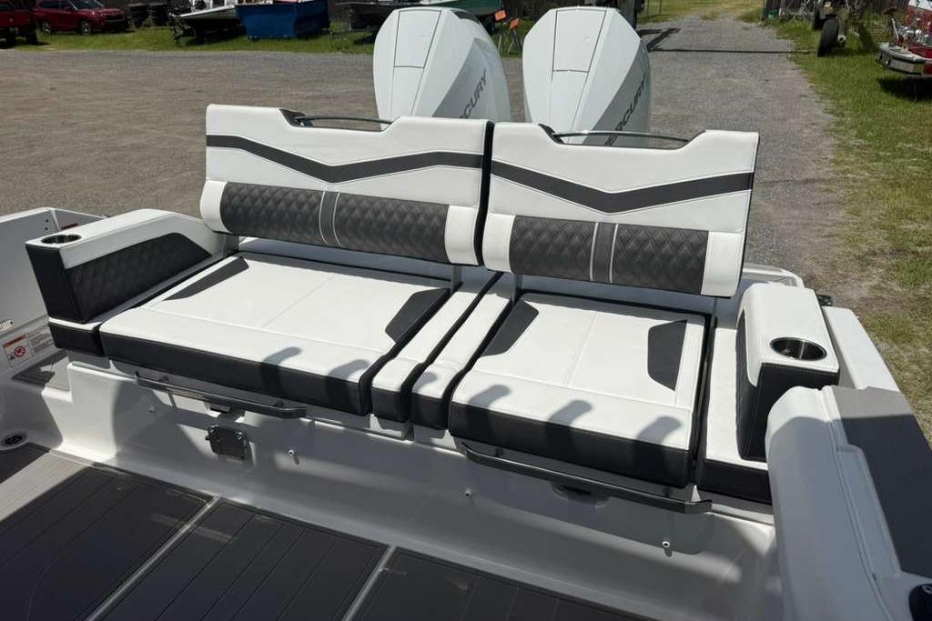2026 Monterey Elite 30 OB boat seating with modern design and cup holders.