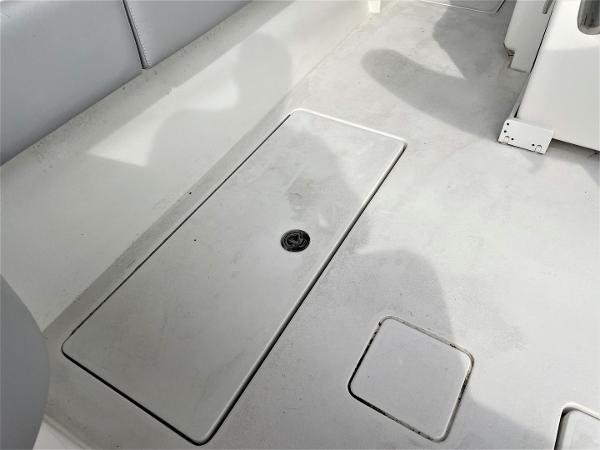 2020 Front Runner 39 Center Console boat deck with storage compartment.