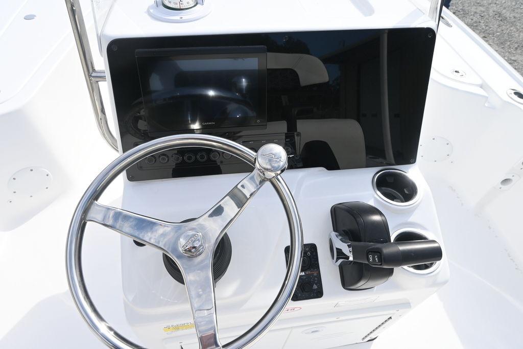 Steering console of 2026 Tidewater 1910 Bay Max boat with modern controls.