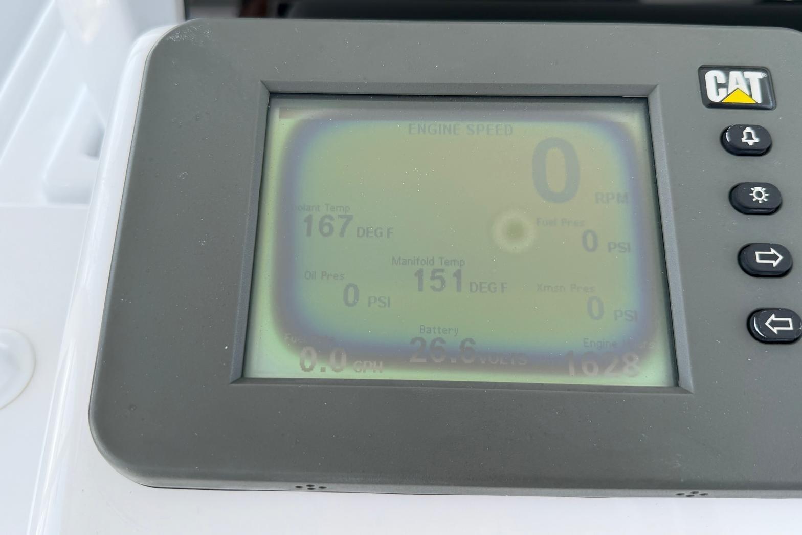 CAT engine monitor display on 2003 Hatteras 54 Convertible yacht, showing engine metrics.