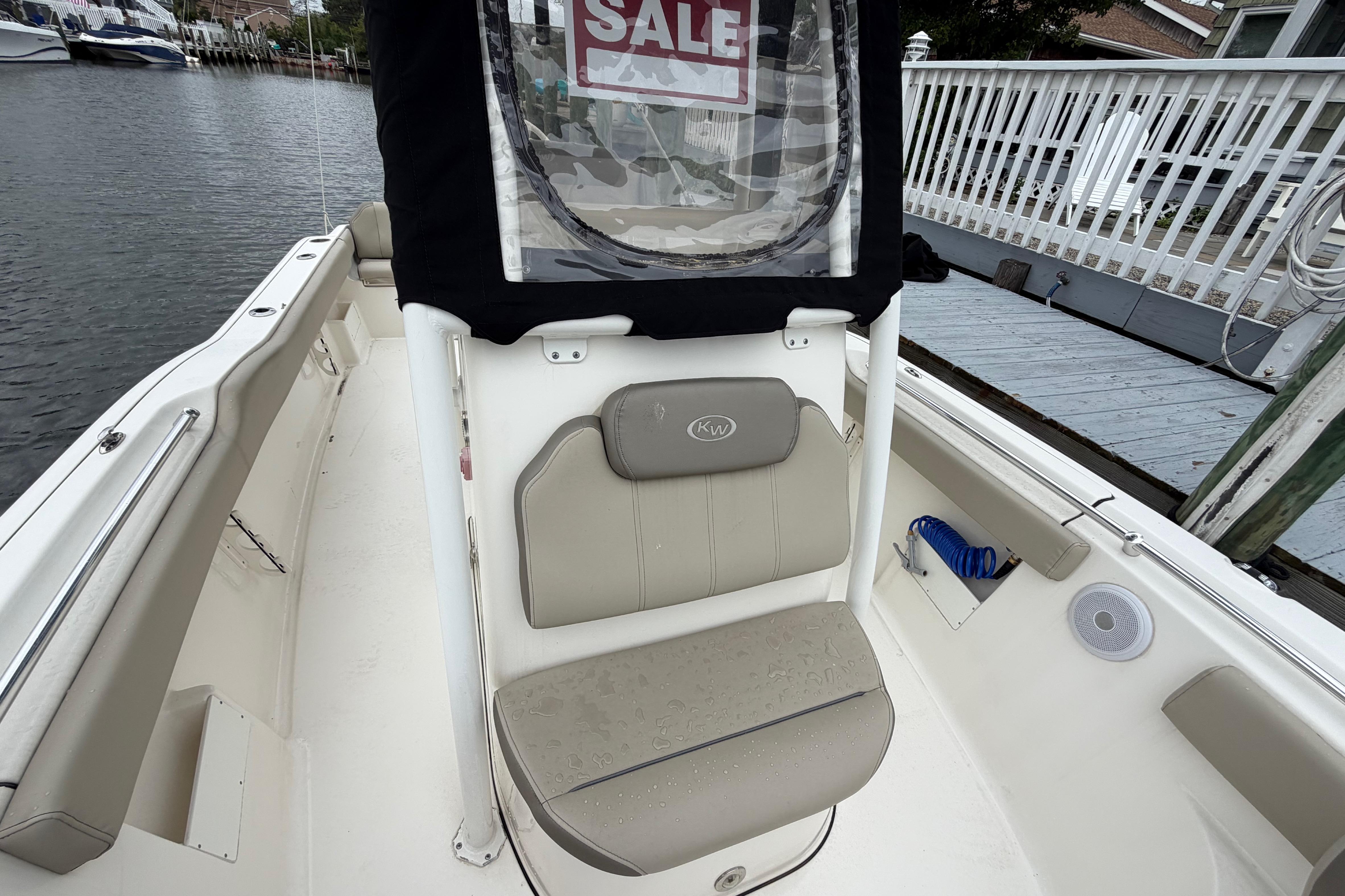 2022 Key West 239 FS boat for sale, docked near waterfront.