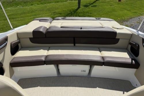 2017 Rinker QX21 BR boat interior with cushioned seating and sleek design.
