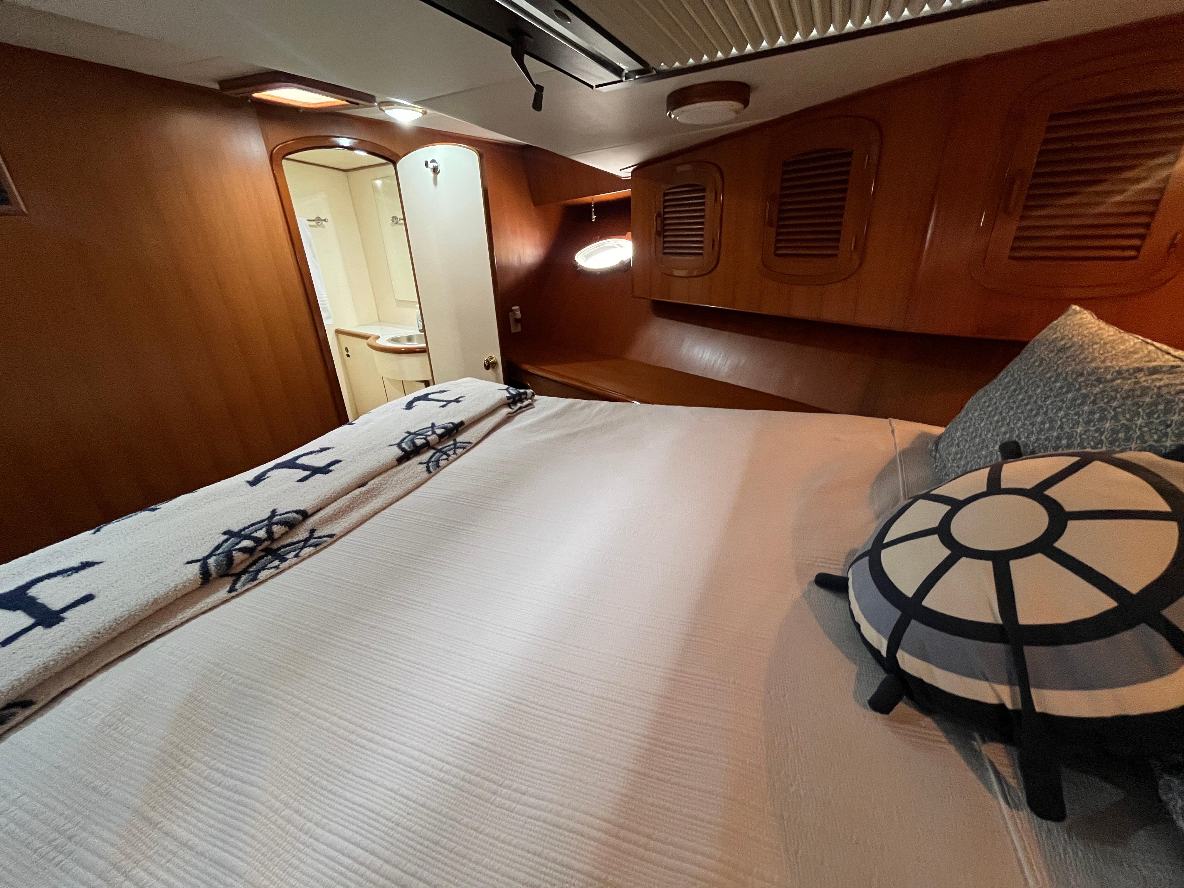 Luxurious cabin interior of a 1999 Mikelson Long-Range Luxury Sportfisher yacht.