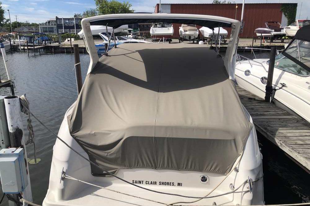 1999 Regal Commodore 2760 boat docked at Saint Clair Shores marina.