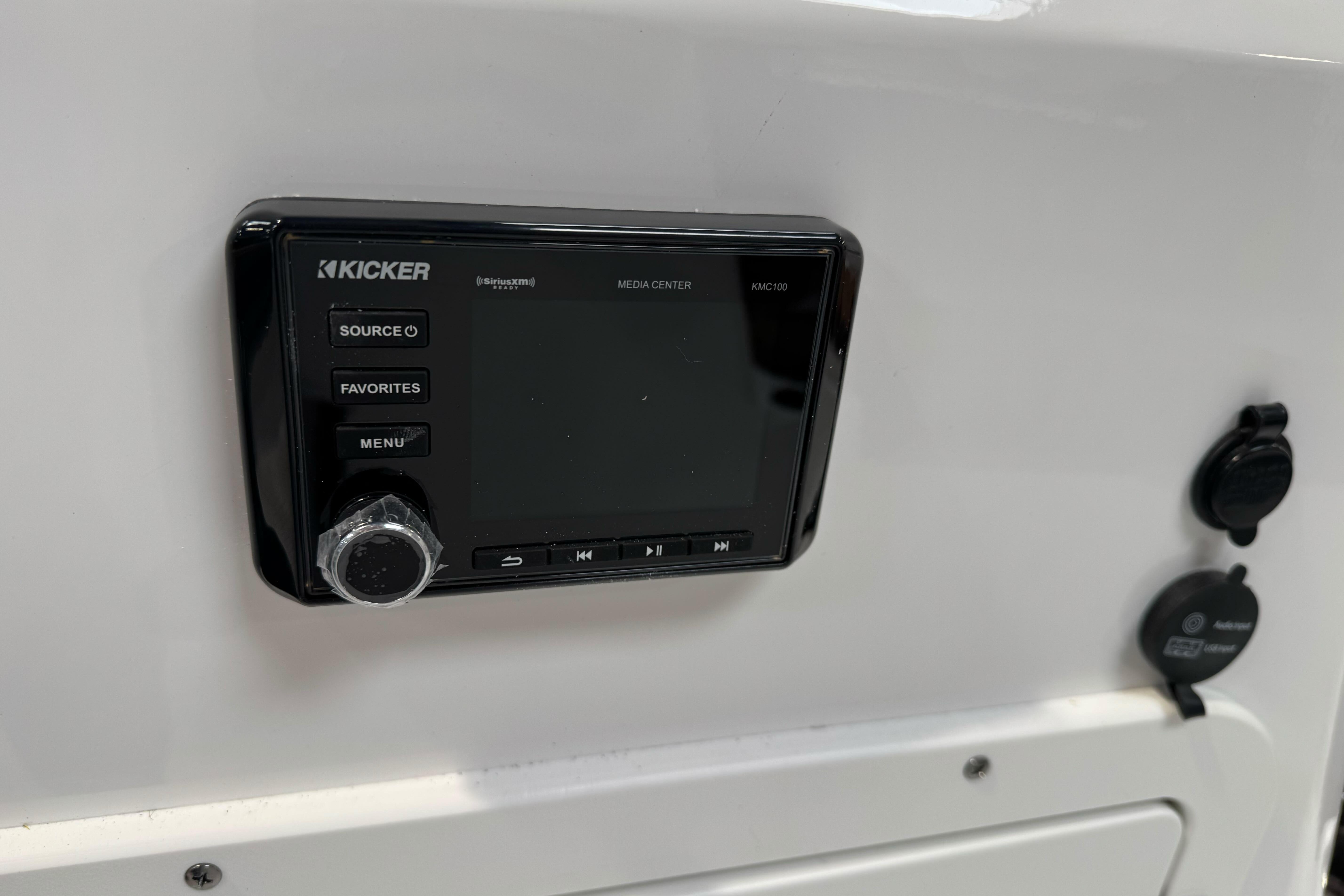 Kicker media center in 2026 Tahoe 2150 boat dashboard.
