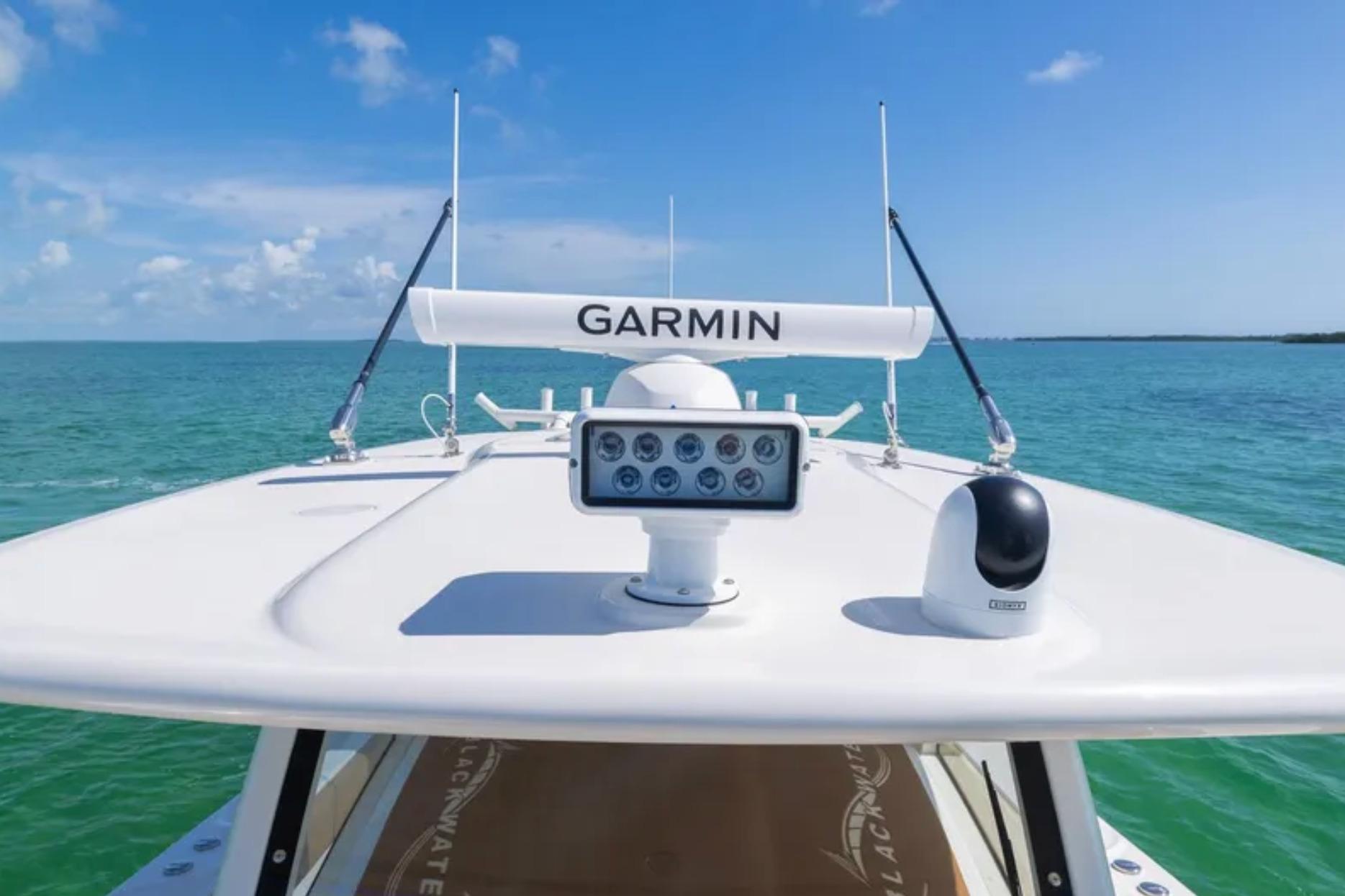 2025 Blackwater 41 Performance Fish boat with Garmin equipment on open sea.
