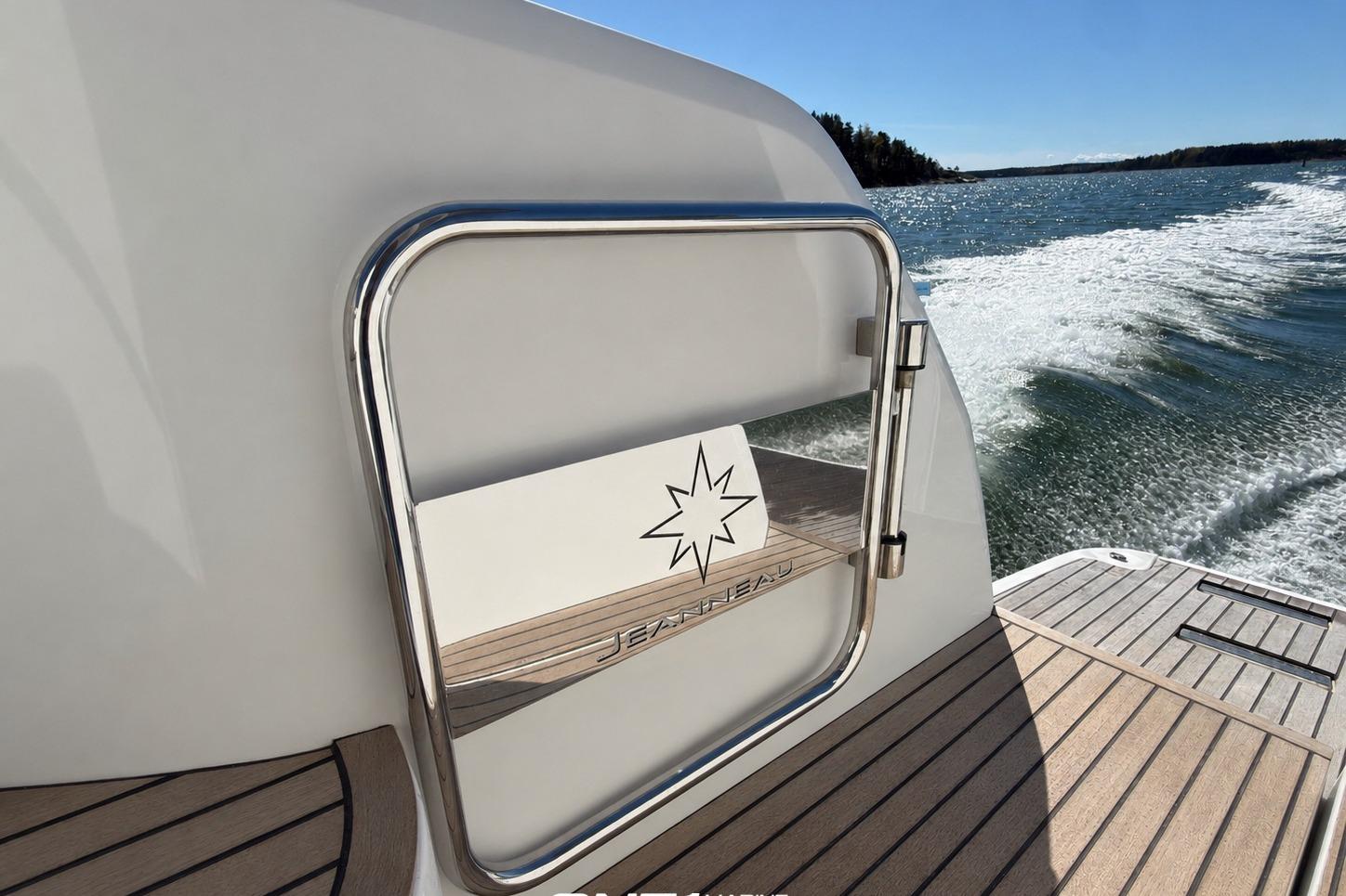 2018 Jeanneau Leader 33 yacht cruising on open water, showcasing sleek design.