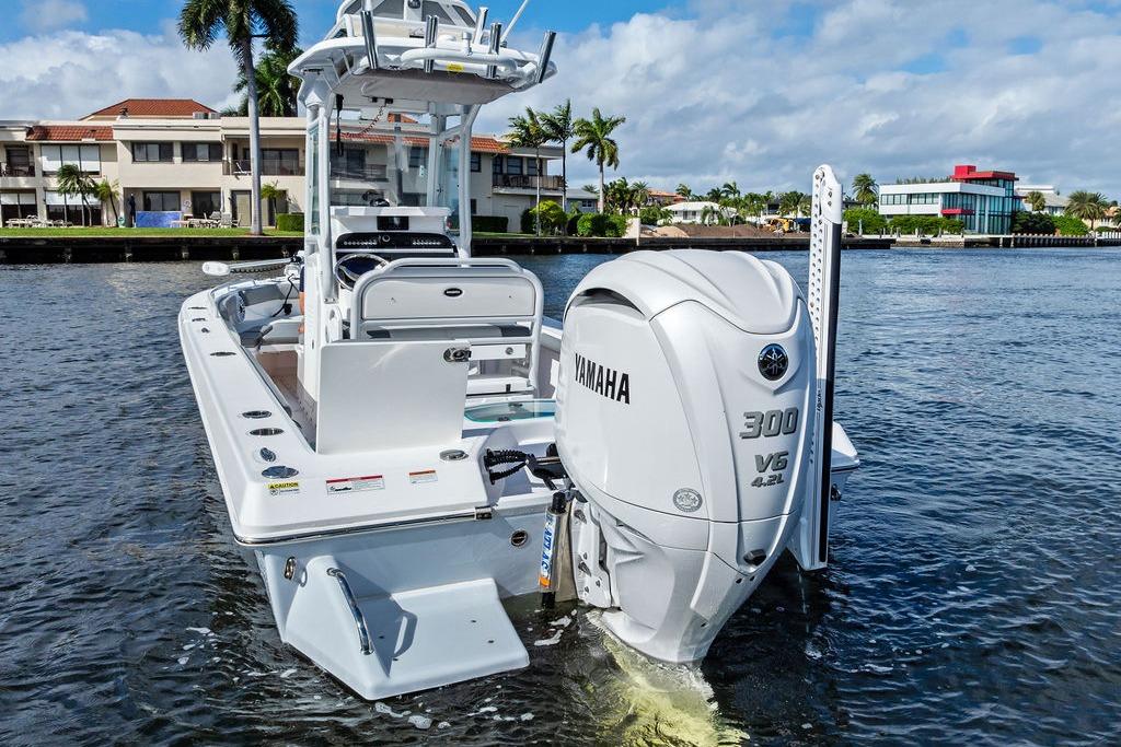 2023 Everglades 243 Center Console boat with Yamaha 300 V6 engine on water.