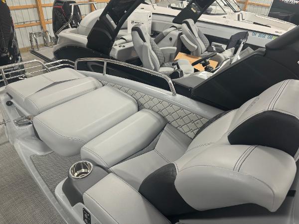 2025 Manitou LX boat interior with luxurious seating and modern design.