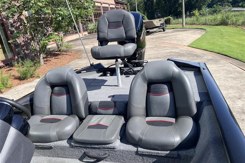 2021 Tracker Pro Team 175 TXW boat with gray seating and outdoor setting.