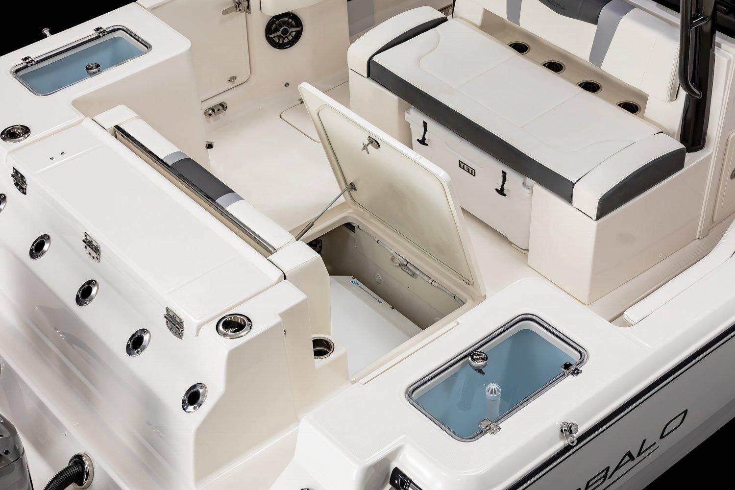 Manufacturer Provided Image: 2025 Robalo R300 Center Console boat interior with open storage compartments and seating.