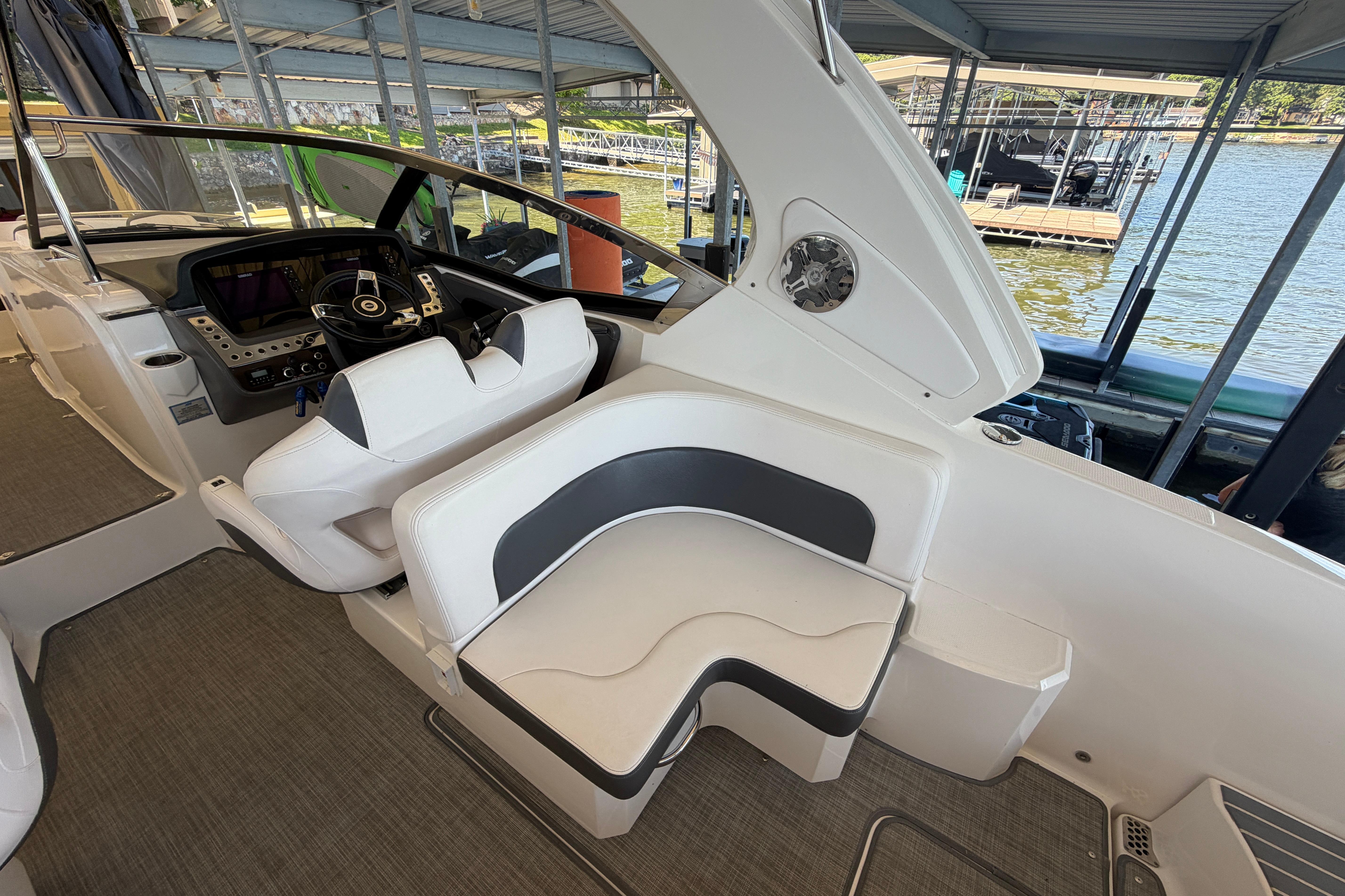 2018 Chaparral 347 SSX boat interior with helm and seating area.