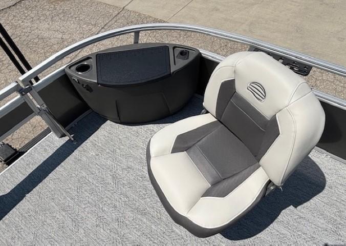 2026 Sun Tracker Bass Buggy 18 DLX boat seat with console and cup holders.